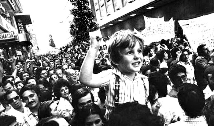 boy in streets during spanish transition to democracy