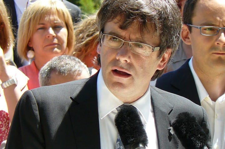 Carles Puigdemont is in exile in Brussels Image Puigdemont acompanyat de càrrecs electes de CiU