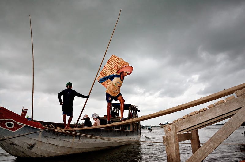 child boat bricks Image ILO Flickr